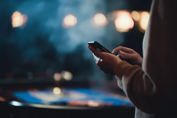 A glowing roulette wheel with cascading chips, symbolizing the engaging live and instant-win games available on D63.